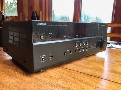 Yamaha home theater receiver on a table.