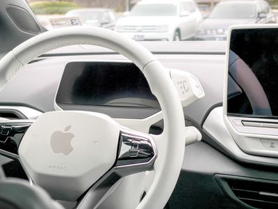 Apple logo on car steering wheel