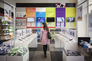 Woman in phone store.