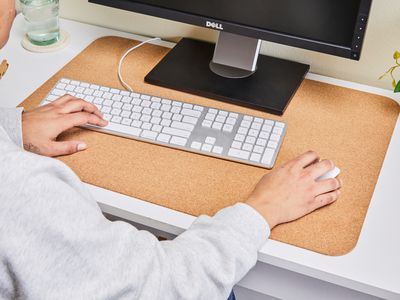 A person using a mouse and keyboard.