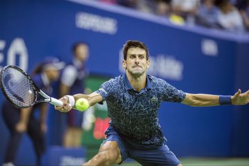 Novak Djokovic battles his way to victory at the US Open Tennis Championship.